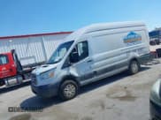 ✅ 2015 Ford Transit Cargo • VIN: 1FTNR3XM6FKA01964 • Lot: 42629479. Listed on IAAI with 328,208 mi. Free auction sales archive from the USA and detailed vehicle history report at DreamBid. Image 18.