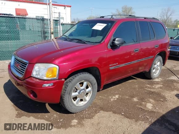 ✅ 2006 GMC Envoy SLT • VIN: 1GKDT13S662189377 • Lot: 42106602. Listed on IAAI with 156,391 mi. Free auction sales archive from the USA and detailed vehicle history report at DreamBid. Image 17.