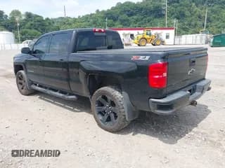 ✅ 2017 Chevrolet Silverado 1500 LT • VIN: 3GCUKREC9HG101466 • Lot: 42776299. Wystawiony na IAAI z przebiegiem 134 401 mil. Bezpłatny archiwum sprzedaży aukcyjnych z USA i szczegółowy raport historii pojazdu na DreamBid. Zdjęcie 3.