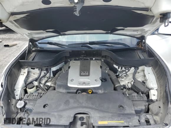 ✅ 2016 Infiniti QX70 • VIN: JN8CS1MU5GM670158 • Lot: 71208415. Listed on Copart with 128,324 mi. Free auction sales archive from the USA and detailed vehicle history report at DreamBid. Image 12.