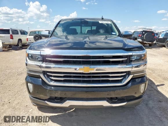 ✅ 2018 Chevrolet Silverado 1500 High Country • VIN: 3GCUKTEC7JG215906 • Лот: 63675725. Опубликован ранее на Copart с пробегом 104 345 миль. Бесплатный доступ к архиву аукционных продаж из США и подробный отчёт об истории автомобиля на DreamBid. Изображение 5.