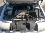 ✅ 1990 Buick Reatta • VIN: 1G4EC33C7LB906610 • Lot: 81840844. Wystawiony na Copart z przebiegiem Nie podano. Bezpłatny archiwum sprzedaży aukcyjnych z USA i szczegółowy raport historii pojazdu na DreamBid. Zdjęcie 11.