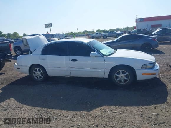 ✅ 1997 Buick Park Avenue Ultra • VIN: 1G4CU5214V4650210 • Lot: 41983953. Listed on IAAI with 176,499 mi. Free auction sales archive from the USA and detailed vehicle history report at DreamBid. Image 13.