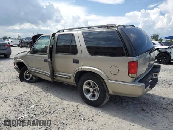 2000 Chevrolet Blazer LS с VIN 1GNCS13W2Y2395156, выставлен на аукционе Copart как лот 65617525 с пробегом 140 108 миль миль и Списание • Salvage title. История ставок и продаж доступна на DreamBid. Изображение 2.