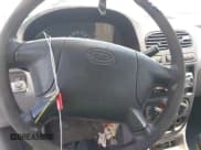 ✅ 2001 Kia Rio • VIN: KNADC123X16506811 • Lot: 42574042. Listed on IAAI with 179,226 mi. Free auction sales archive from the USA and detailed vehicle history report at DreamBid. Image 11.