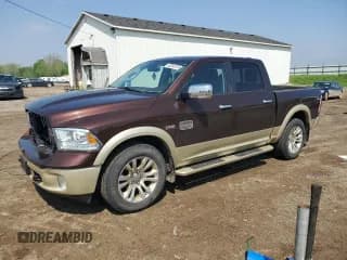 ✅ 2015 Ram 1500 Laramie Limited • VIN: 1C6RR7PTXFS647550 • Lot: 56300135. Listed on Copart with 145,209 mi. Free auction sales archive from the USA and detailed vehicle history report at DreamBid. Image 1.