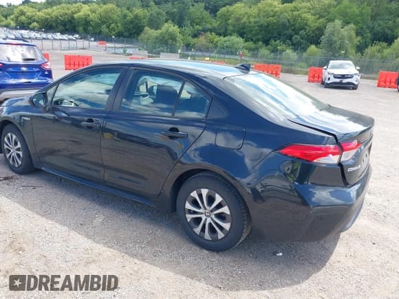 ✅ 2021 Toyota Corolla Hybrid LE • VIN: JTDEAMDE4MJ007503 • Lot: 43052549. Wystawiony na IAAI z przebiegiem 31 868 mil. Bezpłatny archiwum sprzedaży aukcyjnych z USA i szczegółowy raport historii pojazdu na DreamBid. Zdjęcie 3.
