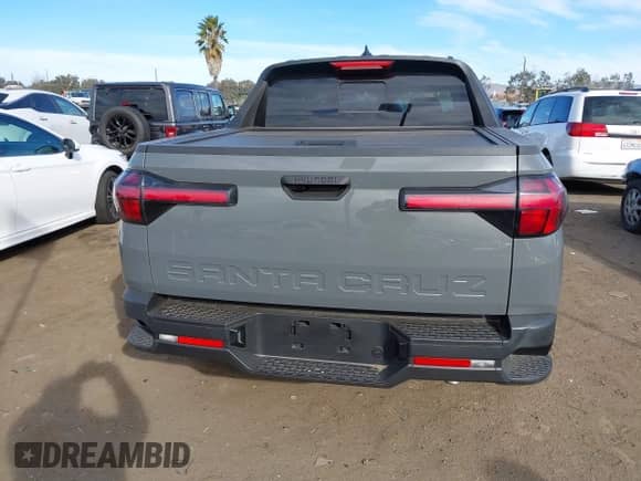 2023 Hyundai Santa Cruz SEL z VIN 5NTJC4AE5PH071917, wystawiony jako IAAI lot #41249984 z przebiegiem 14 703 mil mil oraz . Historia ofert i sprzedaży dostępna na DreamBid. Obrazek 16.