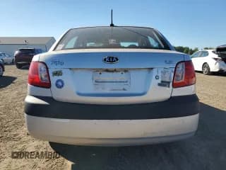 ✅ 2009 Kia Rio LX • VIN: KNADE223796504896 • Lot: 74884404. Listed on Copart with 110,038 mi. Free auction sales archive from the USA and detailed vehicle history report at DreamBid. Image 6.