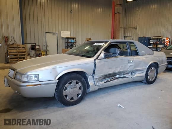 ✅ 2000 Cadillac Eldorado Touring ETC • VIN: 1G6ET1294YU180525 • Lot: 89253455. Listed on Copart with 102,230 mi. Free auction sales archive from the USA and detailed vehicle history report at DreamBid. Image 1.