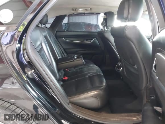 ✅ 2013 Cadillac XTS Livery • VIN: 2G61W5S33D9164395 • Lot: 41793791. Listed on IAAI with 421,499 mi. Free auction sales archive from the USA and detailed vehicle history report at DreamBid. Image 8.