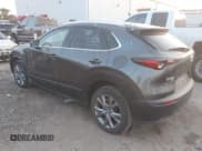 ✅ 2023 Mazda CX-30 S Premium • VIN: 3MVDMBDM4PM526636 • Lot: 42945074. Listed on IAAI with 50,441 mi. Free auction sales archive from the USA and detailed vehicle history report at DreamBid. Image 3.