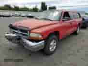 1997 Dodge Dakota z VIN 1B7GL23XXVS265918, wystawiony jako Copart lot #66989384 z przebiegiem 197 880 mil mil oraz Szkoda całkowita • Salvage title. Historia ofert i sprzedaży dostępna na DreamBid. Obrazek 1.
