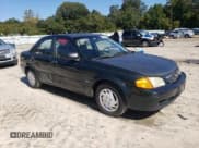 ✅ 1999 Mazda Protege DX • VIN: JM1BJ2226X0182555 • Lot: 71795515. Wystawiony na Copart z przebiegiem 199 035 mil. Bezpłatny archiwum sprzedaży aukcyjnych z USA i szczegółowy raport historii pojazdu na DreamBid. Zdjęcie 4.