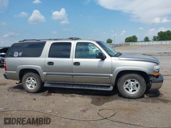 ✅ 2003 Chevrolet Suburban LS • VIN: 3GNEC16Z93G294305 • Лот: 42603228. Опубликован ранее на IAAI с пробегом 169 215 миль. Бесплатный доступ к архиву аукционных продаж из США и подробный отчёт об истории автомобиля на DreamBid. Изображение 13.