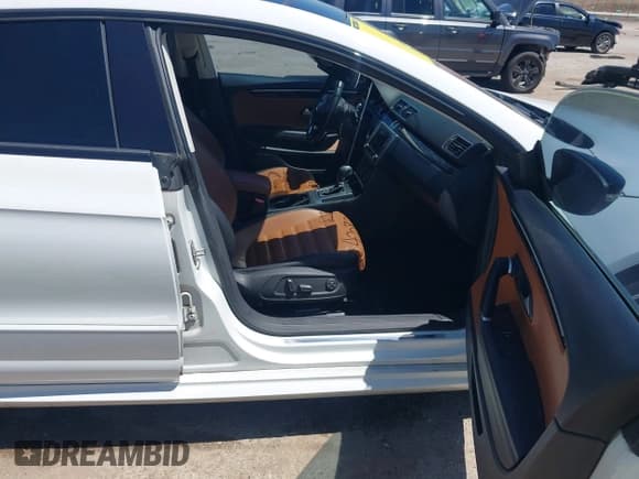 ✅ 2016 Volkswagen CC Executive • VIN: WVWRP7AN8GE518666 • Lot: 42080281. Listed on IAAI with 107,697 mi. Free auction sales archive from the USA and detailed vehicle history report at DreamBid. Image 5.