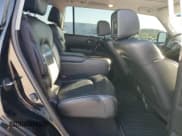 ✅ 2015 Infiniti QX80 • VIN: JN8AZ2NE6F9080701 • Lot: 91086325. Listed on Copart with 138,431 mi. Free auction sales archive from the USA and detailed vehicle history report at DreamBid. Image 11.