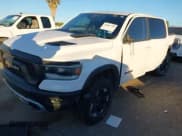 ✅ 2022 Ram 1500 Rebel • VIN: 1C6SRFLT4NN282636 • Lot: 43881798. Listed on IAAI with 38,884 mi. Free auction sales archive from the USA and detailed vehicle history report at DreamBid. Image 2.