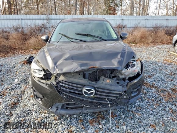 ✅ 2016 Mazda CX-5 Touring • VIN: JM3KE2CY9G0780847 • Lot: 95340005. Wystawiony na Copart z przebiegiem 157 178 mil. Bezpłatny archiwum sprzedaży aukcyjnych z USA i szczegółowy raport historii pojazdu na DreamBid. Zdjęcie 5.