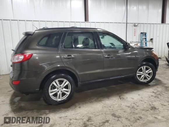✅ 2011 Hyundai Santa Fe SE • VIN: 5XYZHDAG8BG061824 • Lot: 77025964. Listed on Copart with 149,741 mi. Free auction sales archive from the USA and detailed vehicle history report at DreamBid. Image 3.