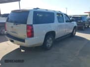 ✅ 2011 Chevrolet Suburban LT • VIN: 1GNSCJE06BR309881 • Lot: 42577452. Listed on IAAI with 254,073 mi. Free auction sales archive from the USA and detailed vehicle history report at DreamBid. Image 4.