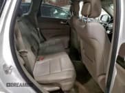 ✅ 2013 Jeep Grand Cherokee Laredo • VIN: 1C4RJFAG0DC582088 • Lot: 94437975. Listed on Copart with 136,143 mi. Free auction sales archive from the USA and detailed vehicle history report at DreamBid. Image 11.