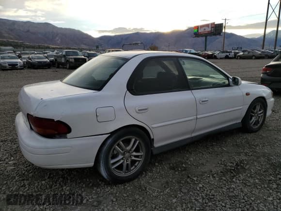 ✅ 2000 Subaru Impreza RS • VIN: JF1GC6755YH503214 • Lot: 77009144. Listed on Copart with 172,163 mi. Free auction sales archive from the USA and detailed vehicle history report at DreamBid. Image 3.