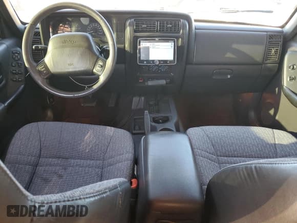 ✅ 1999 Jeep Cherokee Sport • VIN: 1J4FT68S6XL562840 • Lot: 81899585. Wystawiony na Copart z przebiegiem 215 276 mil. Bezpłatny archiwum sprzedaży aukcyjnych z USA i szczegółowy raport historii pojazdu na DreamBid. Zdjęcie 8.