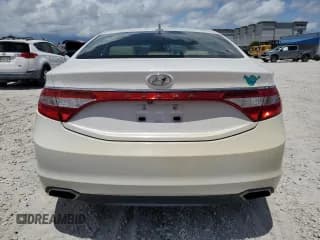 ✅ 2015 Hyundai Azera • VIN: KMHFG4JGXFA468082 • Лот: 69019715. Опубликован ранее на Copart с пробегом 127 984 миль. Бесплатный доступ к архиву аукционных продаж из США и подробный отчёт об истории автомобиля на DreamBid. Изображение 6.