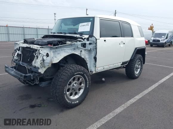 ✅ 2013 Toyota FJ Cruiser • VIN: JTEBU4BF9DK171101 • Lot: 43401291. Listed on IAAI with 113,495 mi. Free auction sales archive from the USA and detailed vehicle history report at DreamBid. Image 2.