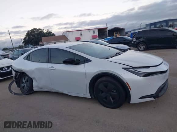 2024 Toyota Prius LE with VIN JTDACAAU6R3035544, listed as a IAAI auction lot 43413536 with 19,097 mi miles and . Bid and sale history available at DreamBid. Image 13.