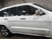 ✅ 2015 Jeep Grand Cherokee Overland • VIN: 1C4RJFCG2FC741015 • Лот: 41607606. Опубликован ранее на IAAI с пробегом 132 038 миль. Бесплатный доступ к архиву аукционных продаж из США и подробный отчёт об истории автомобиля на DreamBid. Изображение 13.