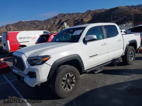 ✅ 2023 Toyota Tacoma TRD Off Road • VIN: 3TMCZ5AN6PM542754 • Lot: 43426171. Listed on IAAI with 59,504 mi. Free auction sales archive from the USA and detailed vehicle history report at DreamBid. Image 2.