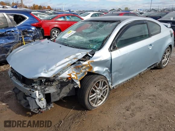 ✅ 2006 Scion tC • VIN: JTKDE167160097398 • Lot: 43556826. Wystawiony na IAAI z przebiegiem 184 564 mil. Bezpłatny archiwum sprzedaży aukcyjnych z USA i szczegółowy raport historii pojazdu na DreamBid. Zdjęcie 2.