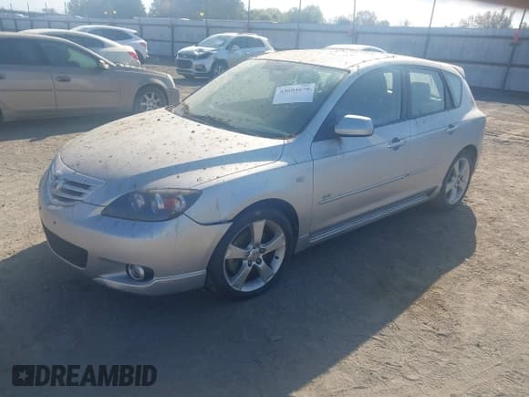✅ 2005 Mazda 3 s • VIN: JM1BK143751256585 • Lot: 43694670. Listed on IAAI with 59,822 mi. Free auction sales archive from the USA and detailed vehicle history report at DreamBid. Image 2.