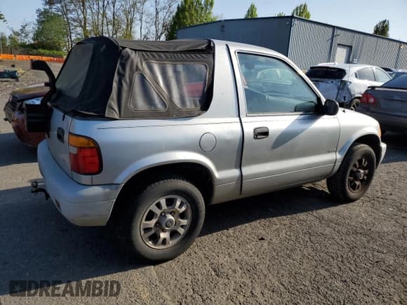 ✅ 2001 Kia Sportage • VIN: KNDJA623615700024 • Lot: 64764145. Listed on Copart with Not provided. Free auction sales archive from the USA and detailed vehicle history report at DreamBid. Image 3.