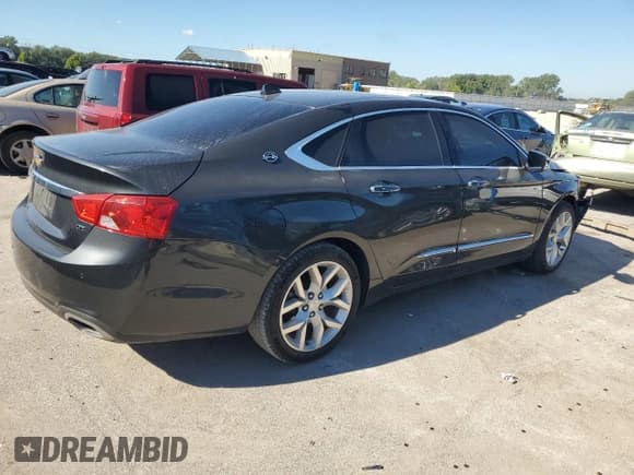 ✅ 2014 Chevrolet Impala LTZ • VIN: 1G1155S31EU123521 • Lot: 69943765. Listed on Copart with 130,958 mi. Free auction sales archive from the USA and detailed vehicle history report at DreamBid. Image 3.