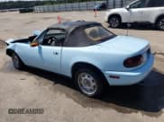 ✅ 1991 Mazda MX-5 Miata Special Edition • VIN: JM1NA3511M0201983 • Lot: 67281945. Listed on Copart with 46,634 mi. Free auction sales archive from the USA and detailed vehicle history report at DreamBid. Image 2.