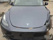 ✅ 2022 Tesla Model Y Long Range • VIN: 7SAYGAEE0NF520722 • Lot: 93269245. Listed on Copart with Not provided. Free auction sales archive from the USA and detailed vehicle history report at DreamBid. Image 12.