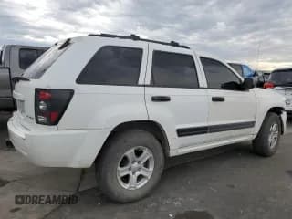 ✅ 2005 Jeep Grand Cherokee Laredo • VIN: 1J4HR48N65C631934 • Лот: 92327445. Опубликован ранее на Copart с пробегом 190 921 миль. Бесплатный доступ к архиву аукционных продаж из США и подробный отчёт об истории автомобиля на DreamBid. Изображение 3.