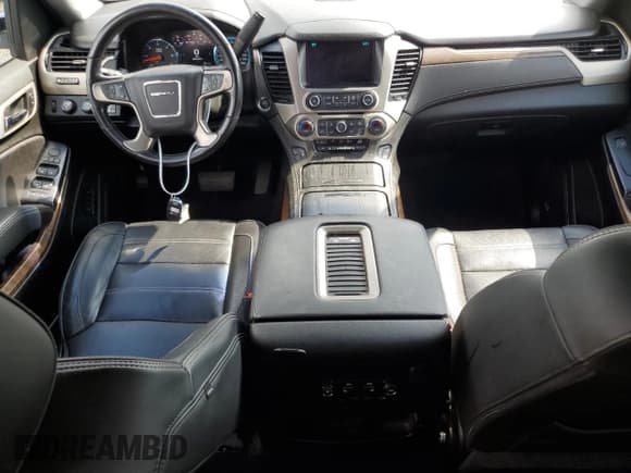 ✅ 2019 GMC Yukon Denali • VIN: 1GKS2CKJ2KR407301 • Lot: 64292375. Listed on Copart with 104,440 mi. Free auction sales archive from the USA and detailed vehicle history report at DreamBid. Image 8.