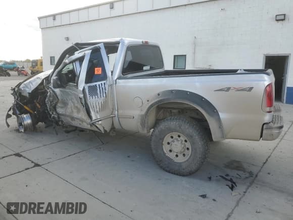 ✅ 1999 Ford F-250 XL • VIN: 1FTNX21L9XED72424 • Lot: 91260165. Listed on Copart with 186,022 mi. Free auction sales archive from the USA and detailed vehicle history report at DreamBid. Image 2.