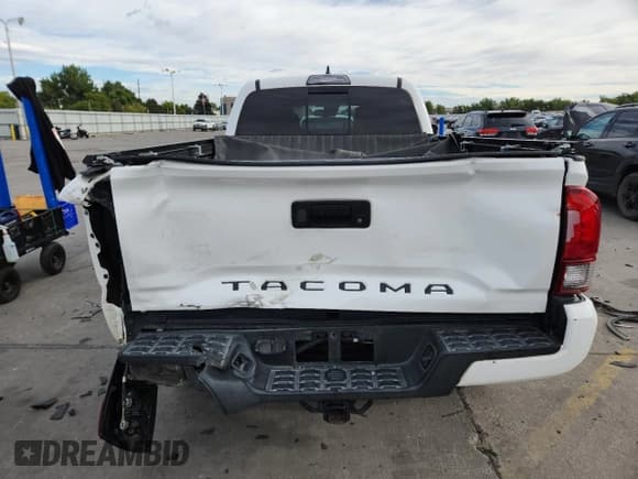 ✅ 2018 Toyota Tacoma TRD Off Road • VIN: 3TMDZ5BN2JM042195 • Lot: 81576125. Listed on Copart with 90,967 mi. Free auction sales archive from the USA and detailed vehicle history report at DreamBid. Image 6.
