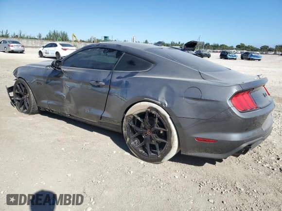 ✅ 2021 Ford Mustang GT Premium • VIN: 1FA6P8CF1M5133899 • Lot: 91695185. Wystawiony na Copart z przebiegiem 16 872 mil. Bezpłatny archiwum sprzedaży aukcyjnych z USA i szczegółowy raport historii pojazdu na DreamBid. Zdjęcie 2.