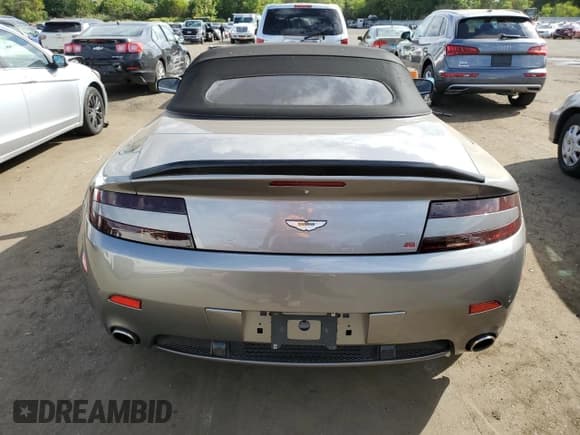 ✅ 2008 Aston Martin Vantage • VIN: SCFBF04B98GD08407 • Лот: 80865755. Опубликован ранее на Copart с пробегом Не указан. Бесплатный доступ к архиву аукционных продаж из США и подробный отчёт об истории автомобиля на DreamBid. Изображение 6.
