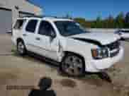 2009 Chevrolet Tahoe LTZ с VIN 1GNFC33079R303405, выставлен на аукционе Copart как лот 87444915 с пробегом 156 586 миль миль и Списание • Salvage title. История ставок и продаж доступна на DreamBid. Изображение 4.