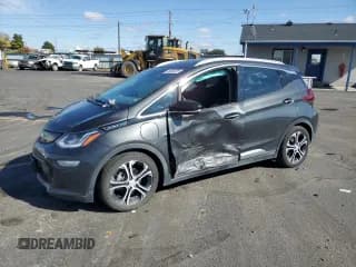 ✅ 2019 Chevrolet Bolt EV Premier • VIN: 1G1FZ6S04K4135454 • Лот: 86636035. Опубликован ранее на Copart с пробегом 88 073 миль. Бесплатный доступ к архиву аукционных продаж из США и подробный отчёт об истории автомобиля на DreamBid. Изображение 1.