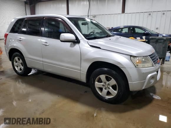 ✅ 2012 Suzuki Grand Vitara Premium • VIN: JS3TD0D62C4100227 • Lot: 84010025. Listed on Copart with 113,353 mi. Free auction sales archive from the USA and detailed vehicle history report at DreamBid. Image 4.