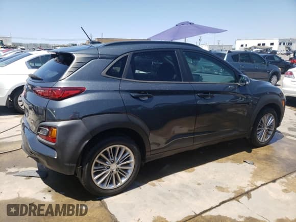 ✅ 2020 Hyundai Kona SEL • VIN: KM8K22AA5LU573202 • Лот: 63812343. Опубликован ранее на Copart с пробегом 41 335 миль. Бесплатный доступ к архиву аукционных продаж из США и подробный отчёт об истории автомобиля на DreamBid. Изображение 3.