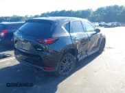 ✅ 2019 Mazda CX-5 Sport • VIN: JM3KFABMXK1552901 • Lot: 43104258. Listed on IAAI with 104,368 mi. Free auction sales archive from the USA and detailed vehicle history report at DreamBid. Image 4.